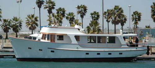 Retrofit of powered active fins to a plank-on-frame wooden motoryacht