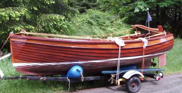 freshly sanded and varnished, seka leaving Trevor's boatshop